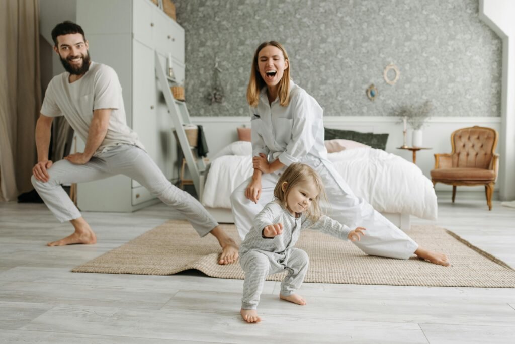 pexels-photo-7220529-7220529 A joyful family engaging in morning stretches together, fostering a fun and healthy routine.